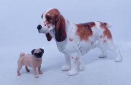 Two Ceramic Dogs including Royal Doulton Spaniel HN1002 and a Beswick Pug (2)