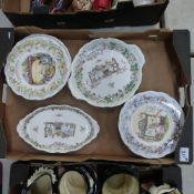 Royal Doulton, Eleven Brambly Hedge Collectors Plates and three serving dishes (1 Tray)