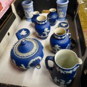 A collection of Wedgwood jasperware including 19th century dark blue Teapot, vases, dressing table