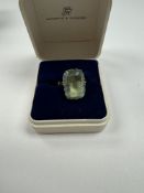9ct yellow gold cocktail ring set with step cut blue paste, size Q, marked 9ct, approx 4.15g