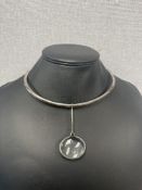 Georg Jensen; a Silver 'Dew Drop' rock crystal pendant necklace, designed by Vivianna Torun Bülow-Hü