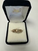 Clogau gold; a 9ct rose gold band ring of decorative design, marked 375, by Clogau Gold, dated 2000,