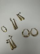 Selection of 9ct gold earrings including drop and hoop examples, not all marked, one odd earring, a