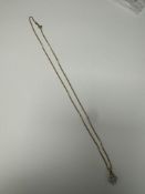 18ct yellow gold curblink neck chain, hung with an 18ct gold pendant, inset with 7 small round cut d