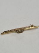 18ct yellow gold bar brooch with applied crown inset with half pearls, marked 18ct, 2.47g approx