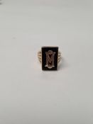 9ct yellow gold signet ring with black rectangular panel central applied gold initial 'M', size P, m