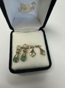 Pair of 9ct drop earrings set with diamonds and emerald and a pair of 9ct gold drop examples with a