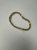An attractive 18ct yellow gold box design bracelet with 5 gamet set square spacers, 19cm, by Pascal,