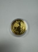 The Royal Mint; A 2023 24K Gold Britannia 1oz, £100 Proof coin, in capsule, 999.9 finesse, 31.2g
