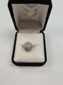 9ct yellow gold diamond cluster ring of rising dome from, approx 0.50 carat diamond combined, marked