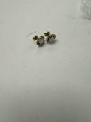 A pair of 9ct gold opal and clear stone cluster earrings