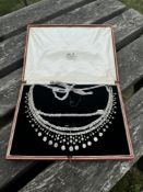 A beautiful Antique fringe tiara, A white metal frame with detachable necklace, the necklace with al