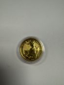 The Royal Mint; A 2023 24K Gold Britannia 1oz, £100 Proof coin, in capsule, 999.9 finesse, 31.2g