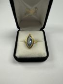 18ct yellow gold dress ring set with marquise cut aquamarine, size T, foreign hall marks 750, approx