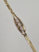 9K yellow gold double flat link bracelet with central panel set 3 white opals, marked 9K, 17cm, appr