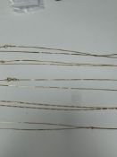Collection of 9ct yellow gold neck chains some AF, one figaro example, all marked 375, 7.12g approx