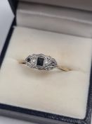 9ct and Platinum Art Deco panel ring with square cut sapphire and diamond chip (one missing) size V,