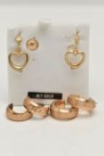 A SELECTION OF YELLOW METAL EARRINGS, to include a pair of 9ct gold textured hoops, lever post