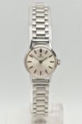 AN OMEGA WRISTWATCH, the silver coloured dial, with black enamel silver coloured hourly applied