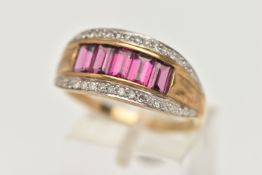 A 9CT GOLD GARNET AND DIAMOND DRESS RING, designed as a central line of rectangular cut garnets to