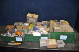 THREE TRAYS CONTAINING VINTAGE CAR PARTS AND TOOLING including tail lights, a Lucas headlight