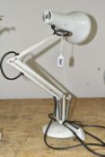 A 'MODEL 90' ANGLEPOISE LAMP, the adjustable desk lamp in off-white/cream finish, stamped 'Herbert