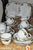 A TWENTY EIGHT PIECE ROYAL ALBERT CROWN CHINA 1920s TEA SET, pattern no 4795, with gilt fruit on