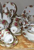 A FIFTY SEVEN PIECE ROYAL ALBERT 'OLD COUNTRY ROSES' DINNER SERVICE, comprising a meat plate, a
