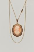 A 9CT GOLD CAMEO PENDANT NECKLACE, oval carved shell cameo, depicting a lady in profile, milgrain
