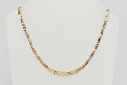 A YELLOW METAL GREEK KEY PATTERN CHAIN NECKLACE, graduated open work Greek key pattern,