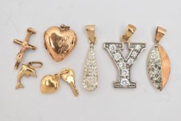 FIVE PENDANTS AND TWO SMALL CHARMS, to include a 9ct gold, cubic zirconia set Y inital pendant,