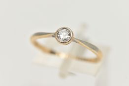 A YELLOW METAL DIAMOND SINGLE STONE RING, an old cut diamond collet set, estimated diamond weight