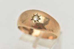 A GENTS 9CT GOLD SIGNET RING, set with a circular cut colourless spinel, in a star setting, polished