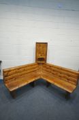 A PINE CORNER BENCH, with a later corner unit to the corner, length 155cm x depth of seat 45cm x