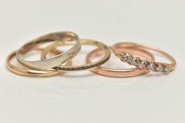 FIVE RINGS, to include three band rings, two with 9ct hallmarks, a 9ct gold six stone diamond