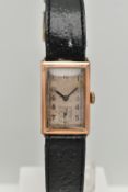 A GENTS 9CT GOLD MID 20TH CENTURY WRISTWATCH, manual wind, rectangular worn silvered dial, Arabic
