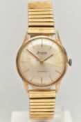 A 9CT GOLD GENTS WRISTWATCH, hand wound movement, round dial signed 'Accurist', baton markers,