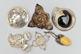 AN ASSORTMENT OF SIX SILVER AND WHITE METAL BROOCHES, the first a silver quatrefoil brooch,