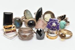 AN ASSORTMENT OF SILVER AND WHITE METAL RINGS, to include six large silver statement rings, five gem