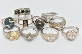 TEN WHITE METAL RINGS, to include a rectangular smoky quartz ring, an imitation pearl ring,