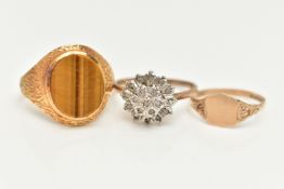 THREE 9CT GOLD RINGS, to include a textured signet ring set with an oval tiger's eye panel, a