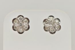 A PAIR OF DIAMOND CLUSTER STUD EARRINGS, each designed as a floral cluster of brilliant cut