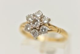 AN 18CT GOLD DIAMOND CLUSTER RING, designed as a cluster of brilliant cut diamonds in claw settings,
