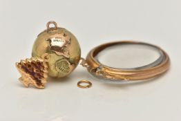 THREE ITEMS OF YELLOW METAL JEWELLERY, to include a pendant in the form of planet earth, fitted with