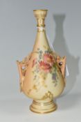 A ROYAL WORCESTER BLUSH IVORY BUD VASE, with twin pierced handles, printed and tinted with sprays of