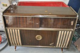 A 1940s BLAUPUNKT KANSAS DE LUXE RADIO GRAM with polished walnut veneer cabinet, a Garrard turntable