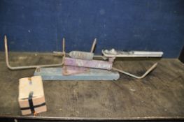 A BIRD MASTER TRAP CLAY PIDGEON SHOOTER and a box of clays (Condition Report some surface rust and