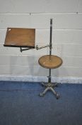 A REPRODUCTION MUSIC STAND, the tubular metal support holding an articulated arm and a fixed