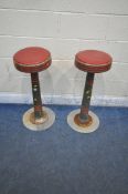 A PAIR OF MID CENTURY SODA SHOP / ICE-CREAM PARLOUR / DINER SWIVEL STOOLS, with red upholstery and