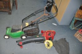 A PERFORMANCE POWER ELECTRIC MOWER with grass box and a Power Devil Garden Vac/blower with